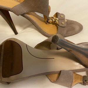 Size 10 Nine West dressy shoe. Stacked heel. Some wear on inside strap.